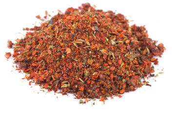 Heaps of spices on white background