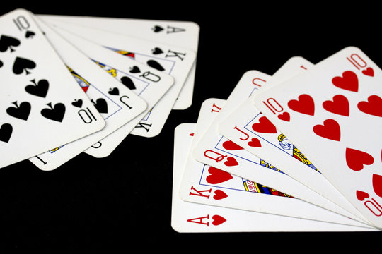 Poker Playing Cards on Black Background