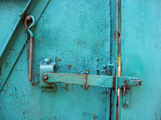 The old lock on a metal gate