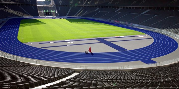 Workers In Soccer Stadium