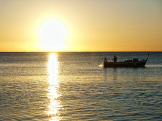 Fishing at sunrise