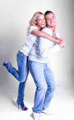 Happy Young loving couple hugging