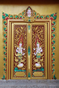 art carving on door of temple, Wat Rahan, Ban Dan, Buriram