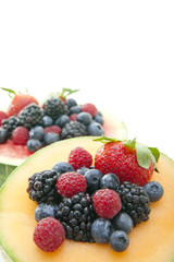 Berries in melon bowls