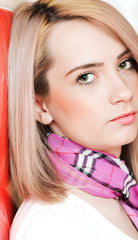 Blond girl against colourful background