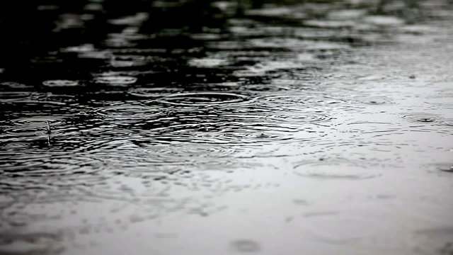 closeup footage  rain on water surface.