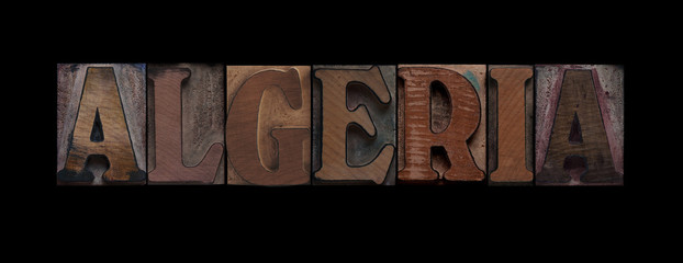 the word Algeria in old letterpress wood type