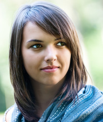 Fototapeta premium Beautiful young woman with gray shawl