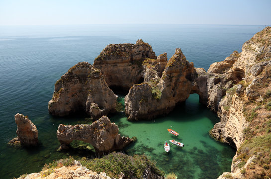 Cliffs At The Algarve Coast In Portugal