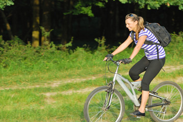 Beautiful lady enjoying traveling in natural environment