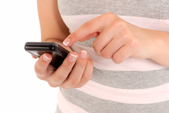 Unrecognizable young girl using a touch phone modern gadget.