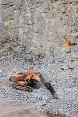 Digger in a quarry