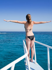 Woman sunbathing on the ship