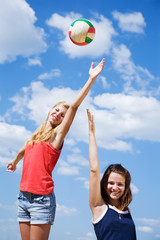 Young girls playing volleyball