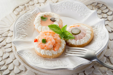 variety of canapes - antipasti tartine miste