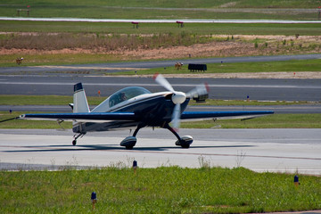 Blue Prop Plane on Taxiway