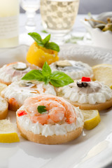 variety of canapes - antipasti tartine miste