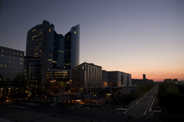 Obraz premium Skyscrapers with illuminted windows