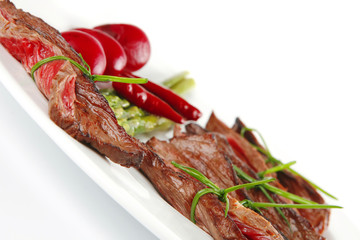 meat and vegetables on white plate