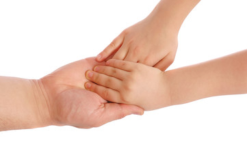Children's palms in a reliable man's hand