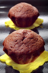 Two chocolate muffins