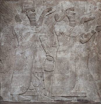 Ancient relief of assyrian gods