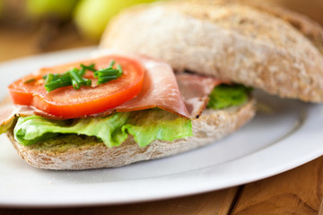 Sandwich with ham and vegetables
