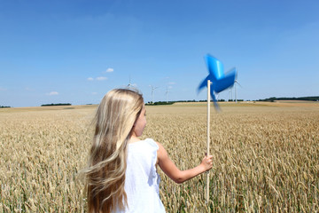 Little girl and renewable energy