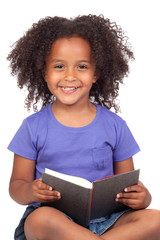 Student little girl reading with a book