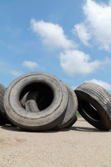 Heap of old truck tires prepared for recycling