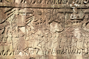 Fototapeta na wymiar Carving stone wall, Angkor Thom, Siem Reap, Cambodia.