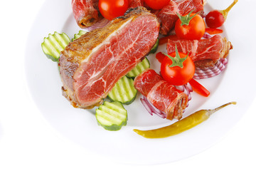 meat rolls and chunk on white