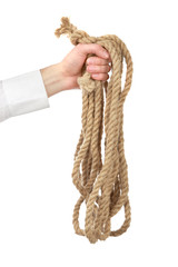 Man's the hand holds a cord