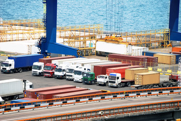 Naklejka premium Port warehouse with cargoes and containers
