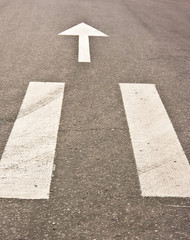Pedestrian crossing on road at day