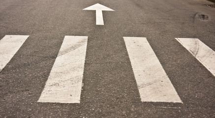 Pedestrian crossing on road at day