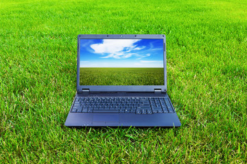 Laptop on grass