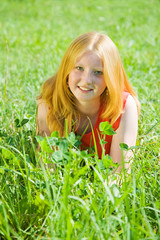 teenager girl  at meadow grass