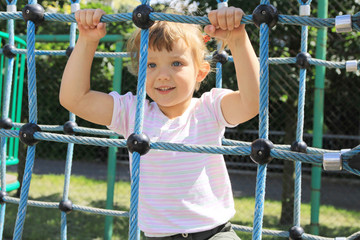 four year old girl on the playground
