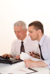 Fototapeta premium Two businessmen working together