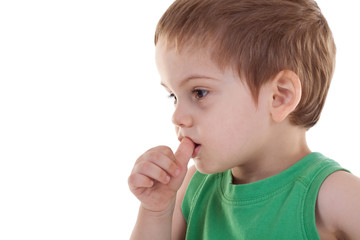 kid with finger in his mouth