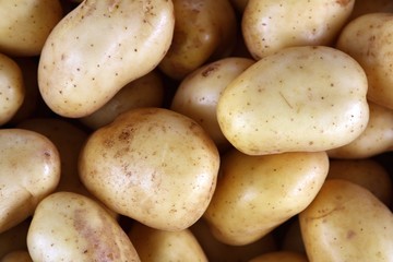 potatoes on market texture background