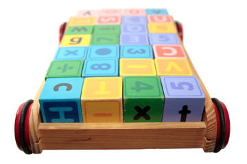 childrens play letter blocks in cart