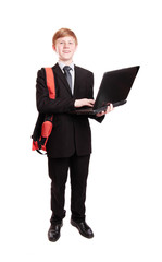 Boy in suit with notebook