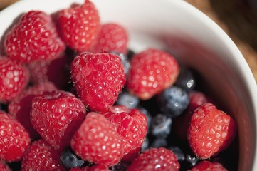 Bowl Of Rapspberries And Blueberries