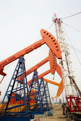Drilling rig and  pumpjacks