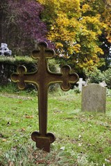 Cross Grave Marker In A Cemetery