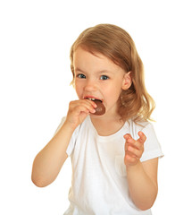 little girl eating chocolate.