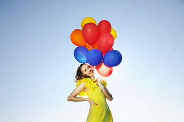 Woman with balloons