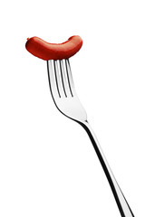 Close up of sausage and fork isolated on white background